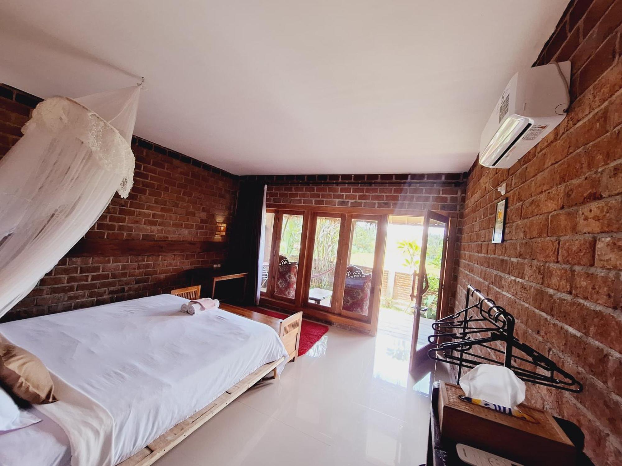 Bunga Maliq Bungalow Lombok Tetebatu Rum bild